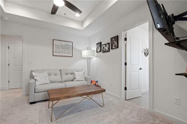 15318 W 172nd Pl, Olathe, KS 66062 - living area with light carpet, a ceiling fan, and baseboards