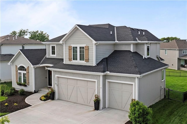 15318 W 172nd Pl, Olathe, KS 66062 - view of front facade with a shingled roof, concrete driveway, and a garage