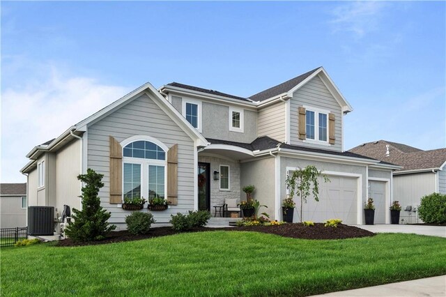 15318 W 172nd Pl, Olathe, KS 66062 - traditional-style house with concrete driveway, a garage, and central AC