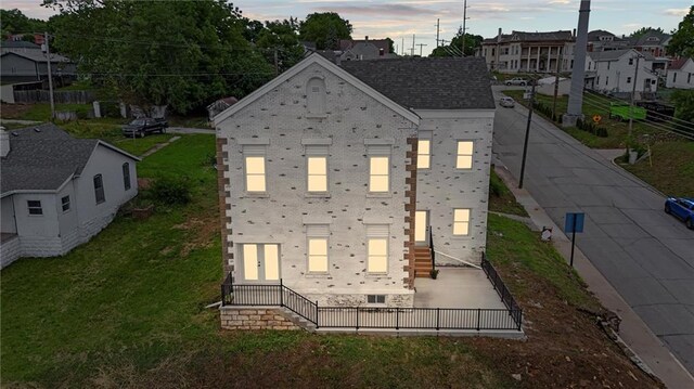 1003 Commercial St, Atchison, KS 66002 - back of house with stairway