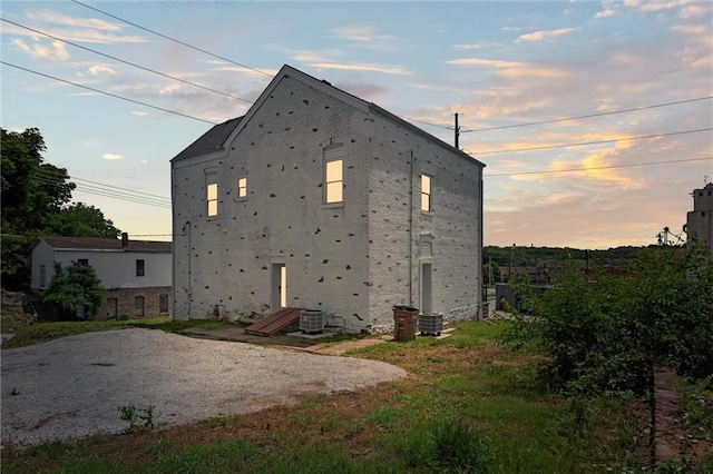 1003 Commercial St, Atchison, KS 66002 - rear view of house with cooling unit