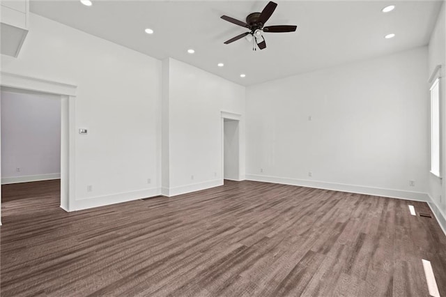 1003 Commercial St, Atchison, KS 66002 - spare room featuring a ceiling fan, recessed lighting, wood finished floors, and baseboards