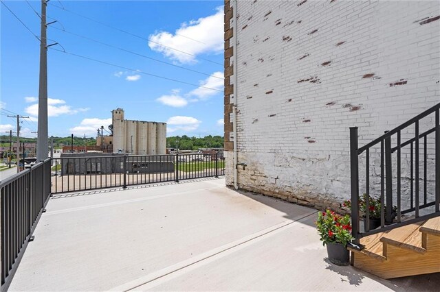 1003 Commercial St, Atchison, KS 66002 - view of patio / terrace with a balcony