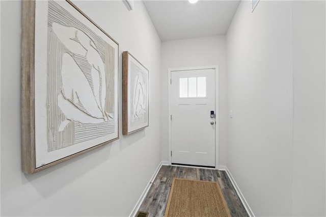 7708 NE 107th Ter, Kansas City, MO 64157 - entryway with dark wood-style flooring and baseboards