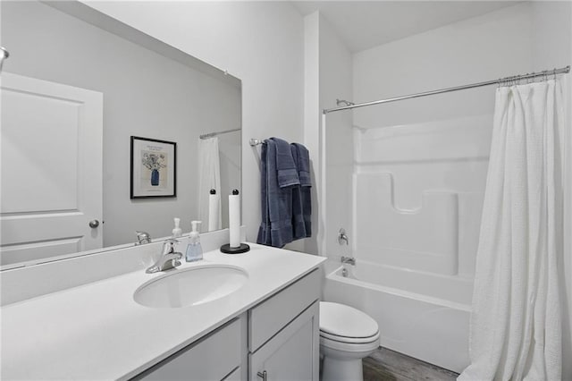7708 NE 107th Ter, Kansas City, MO 64157 - bathroom with vanity, toilet, shower / bathtub combination with curtain, and wood finished floors