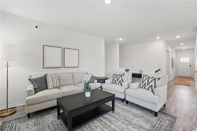 7708 NE 107th Ter, Kansas City, MO 64157 - living area featuring recessed lighting, wood finished floors, and baseboards
