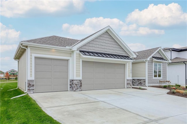 17162 S Hall St, Olathe, KS 66062 - craftsman-style house featuring an attached garage, concrete driveway, a shingled roof, and stone siding