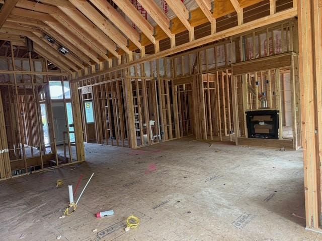 17162 S Hall St, Olathe, KS 66062 - misc room with a fireplace with raised hearth