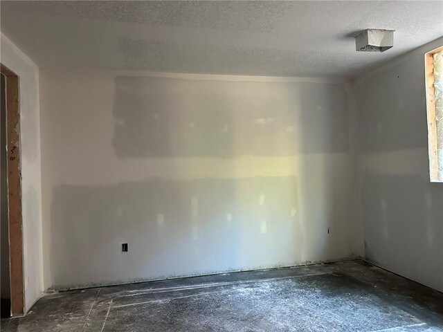 17162 S Hall St, Olathe, KS 66062 - unfurnished room with a textured ceiling
