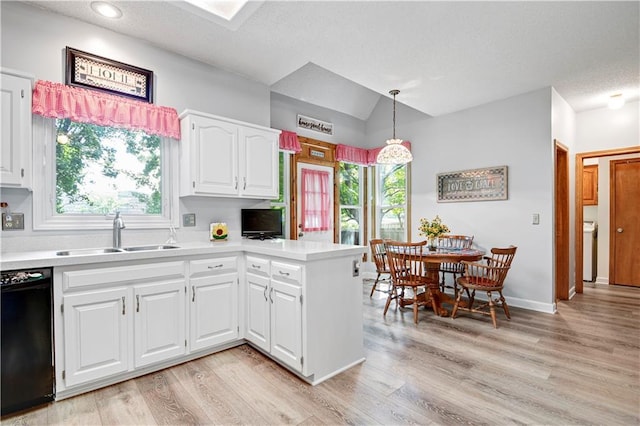 8215 W 150th St, Overland Park, KS 66223 - kitchen with a sink, dishwasher, a peninsula, light countertops, and light wood-style floors