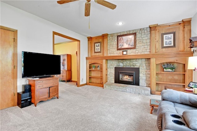 8215 W 150th St, Overland Park, KS 66223 - living area with light colored carpet, ceiling fan, a fireplace, and baseboards