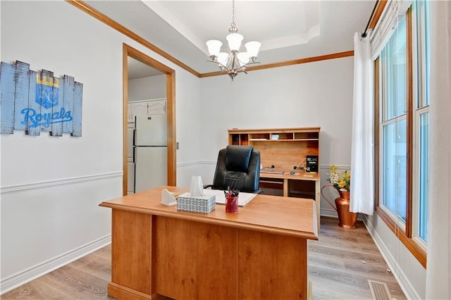 8215 W 150th St, Overland Park, KS 66223 - office featuring light wood-style flooring, a chandelier, a raised ceiling, ornamental molding, and baseboards