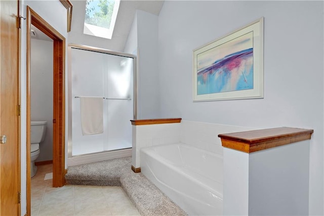 8215 W 150th St, Overland Park, KS 66223 - bathroom with toilet, a skylight, a garden tub, and a stall shower