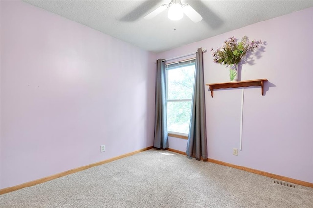 8215 W 150th St, Overland Park, KS 66223 - spare room with light carpet, baseboards, and a ceiling fan