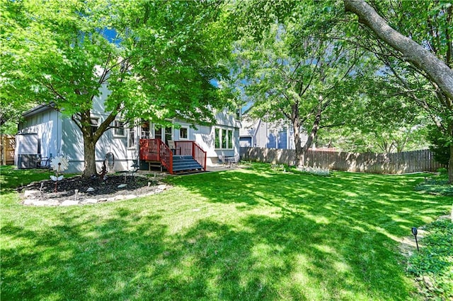8215 W 150th St, Overland Park, KS 66223 - view of yard with a wooden deck