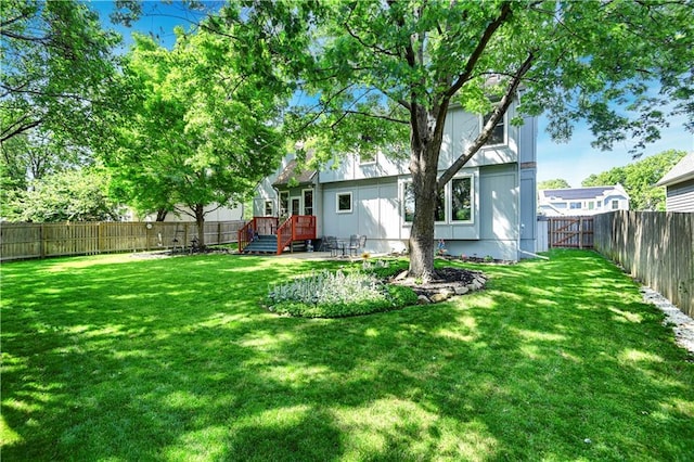 8215 W 150th St, Overland Park, KS 66223 - view of yard featuring a wooden deck