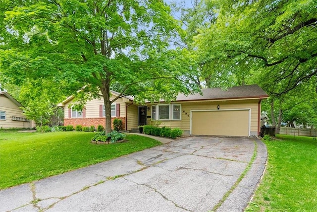 607 E 110th St, Kansas City, MO 64131 - ranch-style home featuring driveway and a garage