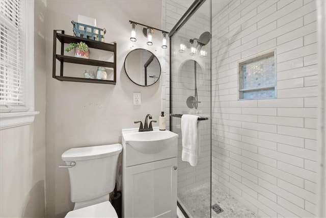 607 E 110th St, Kansas City, MO 64131 - full bathroom featuring vanity, a tile shower, and toilet