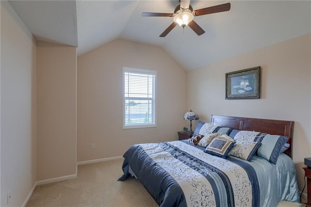 25005 W 85th Ter, Lenexa, KS 66227 - bedroom featuring carpet floors, vaulted ceiling, and a ceiling fan