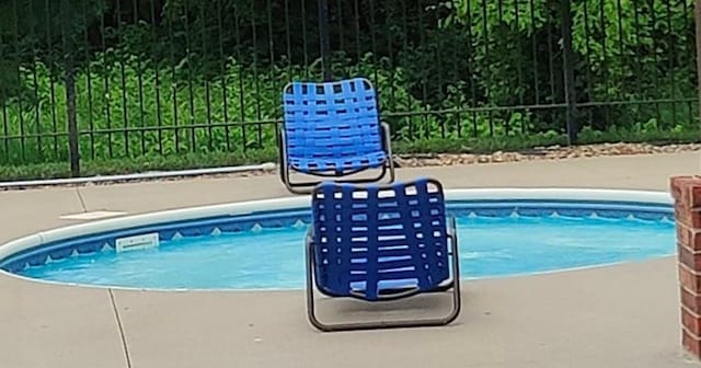 25005 W 85th Ter, Lenexa, KS 66227 - view of pool with a patio