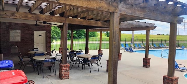 25005 W 85th Ter, Lenexa, KS 66227 - view of patio / terrace featuring a pergola, a community pool, and a ceiling fan