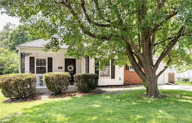 6038 Catalina St, Fairway, KS 66205 - obstructed view of property with a front yard and a garage