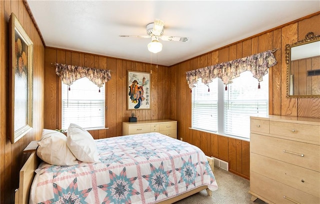 6038 Catalina St, Fairway, KS 66205 - carpeted bedroom with wooden walls and a ceiling fan