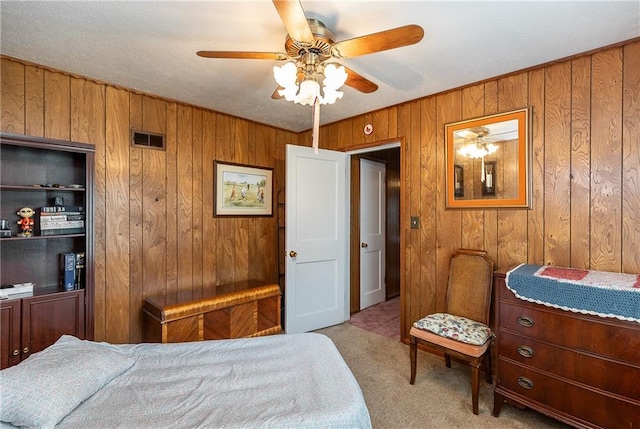 6038 Catalina St, Fairway, KS 66205 - carpeted bedroom with wood walls and a ceiling fan