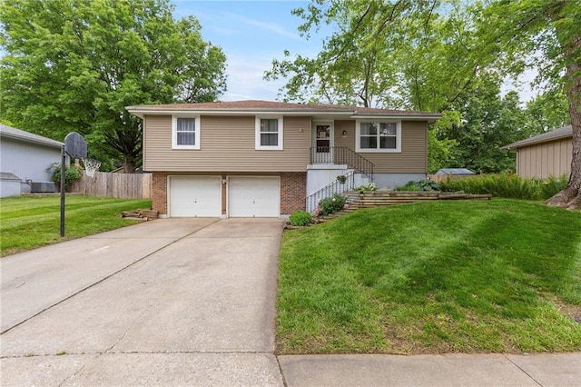 215 SE Country Ln, Lees Summit, MO 64063 - view of front of home featuring brick siding, a garage, and concrete driveway