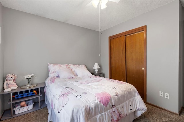 215 SE Country Ln, Lees Summit, MO 64063 - carpeted bedroom featuring a closet, baseboards, and a ceiling fan