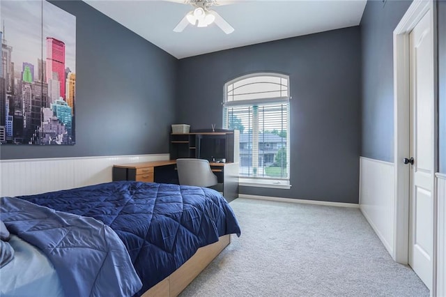 13808 Richards St, Overland Park, KS 66221 - bedroom featuring carpet flooring, wainscoting, and a ceiling fan