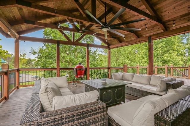 13808 Richards St, Overland Park, KS 66221 - wooden deck featuring an outdoor living space and ceiling fan