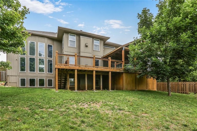 13808 Richards St, Overland Park, KS 66221 - rear view of property featuring a wooden deck