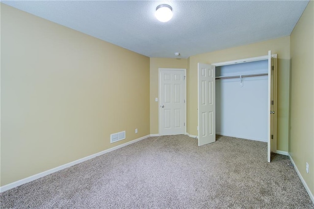 8815 Timber Creek Ln, Pleasant Valley, MO 64068 - unfurnished bedroom with carpet, a textured ceiling, baseboards, and a closet