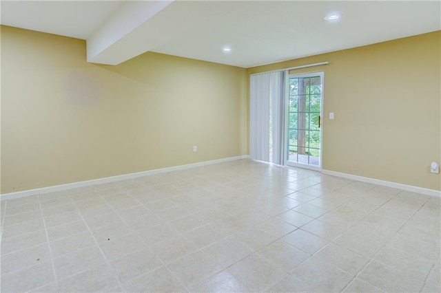 8815 Timber Creek Ln, Pleasant Valley, MO 64068 - empty room with recessed lighting, baseboards, and light tile patterned flooring