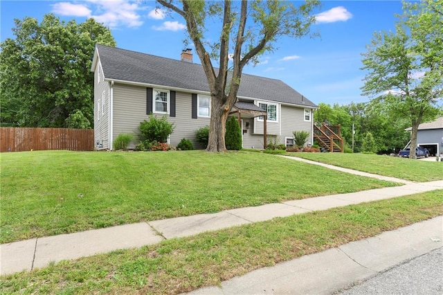 530 Nipper Ln, Leavenworth, KS 66048 - view of front facade with a chimney and stairs
