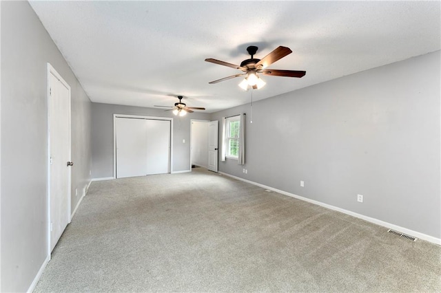 530 Nipper Ln, Leavenworth, KS 66048 - unfurnished room featuring ceiling fan, baseboards, and light carpet
