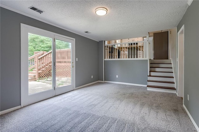 12800 W 100th St, Lenexa, KS 66215 - carpeted spare room featuring a textured ceiling, baseboards, crown molding, and stairs