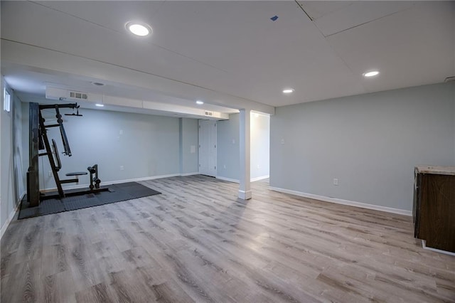 12800 W 100th St, Lenexa, KS 66215 - finished basement featuring baseboards, wood finished floors, and recessed lighting