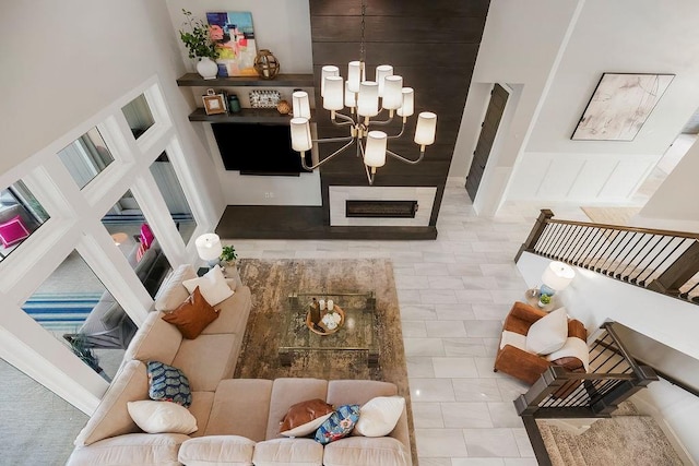 10300 W 174th St, Overland Park, KS 66221 - living area featuring a chandelier