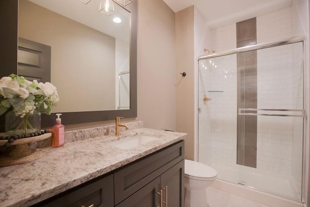 10300 W 174th St, Overland Park, KS 66221 - bathroom featuring vanity, toilet, and a shower stall