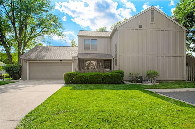4300 W 112th St, Leawood, KS 66211 - view of front facade with an attached garage, concrete driveway, board and batten siding, and a shingled roof
