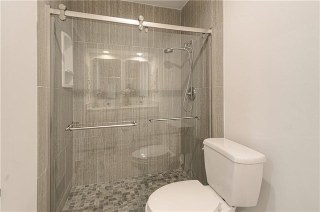 4300 W 112th St, Leawood, KS 66211 - full bathroom featuring toilet and a shower stall