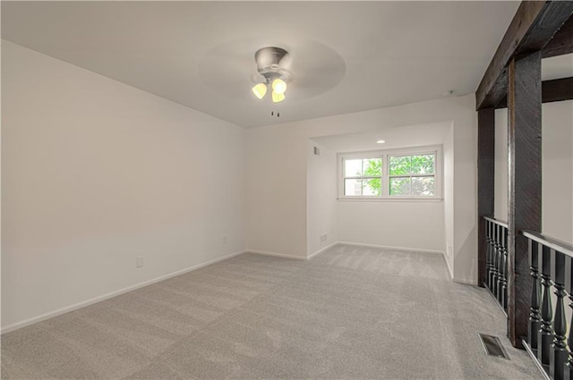 4300 W 112th St, Leawood, KS 66211 - spare room with carpet floors, a ceiling fan, and baseboards