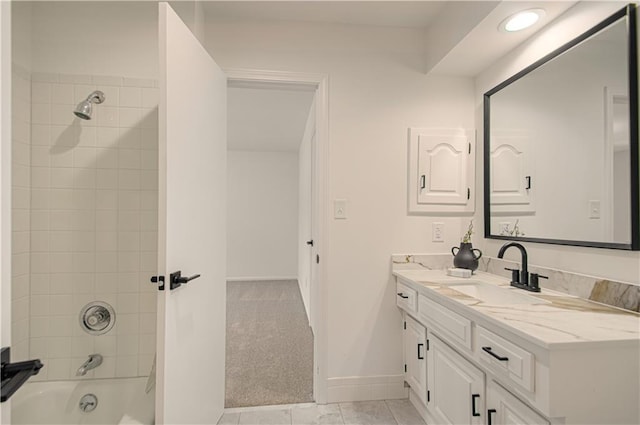 4300 W 112th St, Leawood, KS 66211 - bathroom featuring vanity, shower / bathtub combination, and baseboards