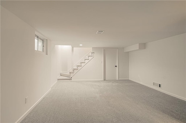 4300 W 112th St, Leawood, KS 66211 - below grade area with carpet flooring, stairs, and baseboards