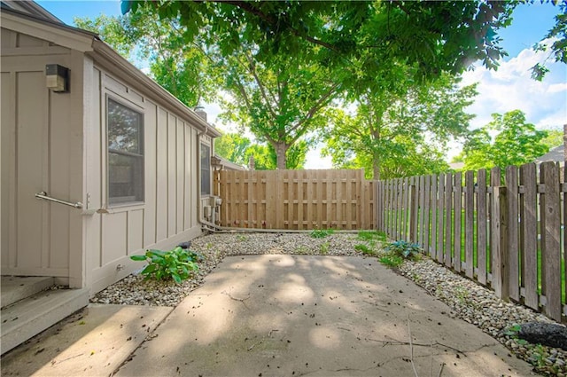 4300 W 112th St, Leawood, KS 66211 - fenced backyard with a patio