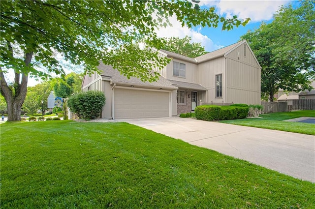 4300 W 112th St, Leawood, KS 66211 - view of front of house featuring driveway, an attached garage, and a shingled roof