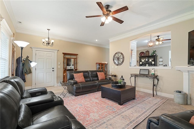 1611 NW Creekland Dr, Grain Valley, MO 64029 - living room with ceiling fan, crown molding, a chandelier, and baseboards