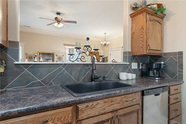 1611 NW Creekland Dr, Grain Valley, MO 64029 - kitchen featuring dishwasher, a sink, dark countertops, brown cabinetry, and crown molding